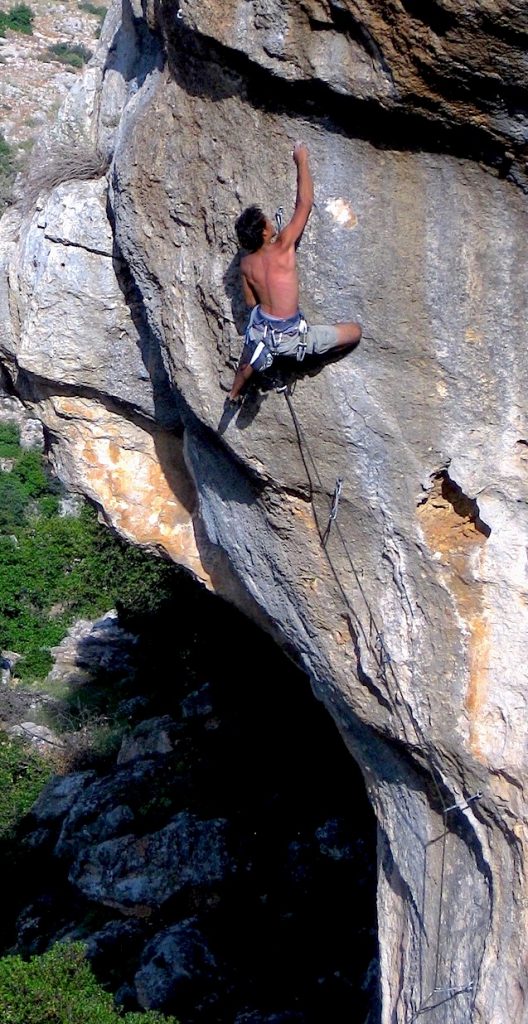 Amjad Sharhour, in a 8a climb in Iraq Al Dub, Ajloun district - Jordan